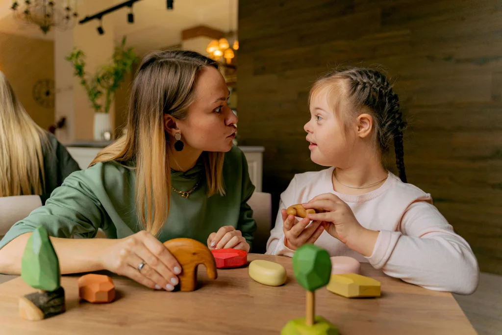 Au Pair caring for her host kid