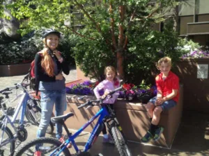 Au Pair and host kids biking
