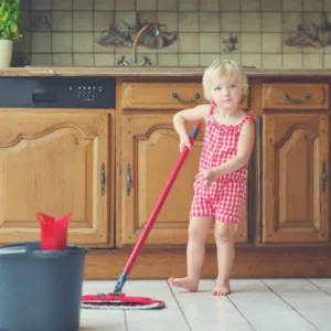 Toddler cleaning mess