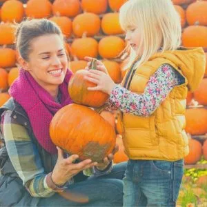 Au Pair and child at the pumpkin patch