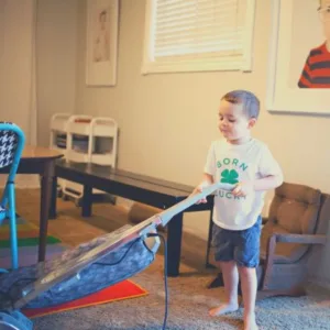 Kid cleaning up