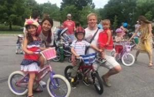 Au Pair and Host Family riding bikes