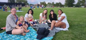 Au Pairs celebrating U.S. Independence day watching fireworks.