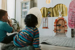 Children watching a puppet show.