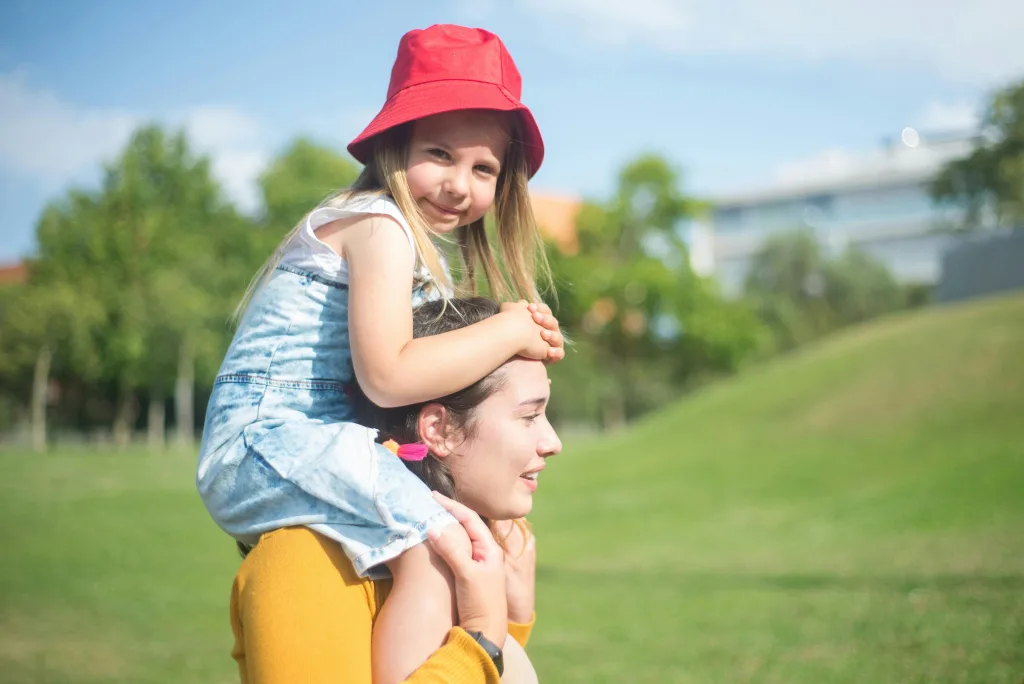 Au Pair having fun with her host kid