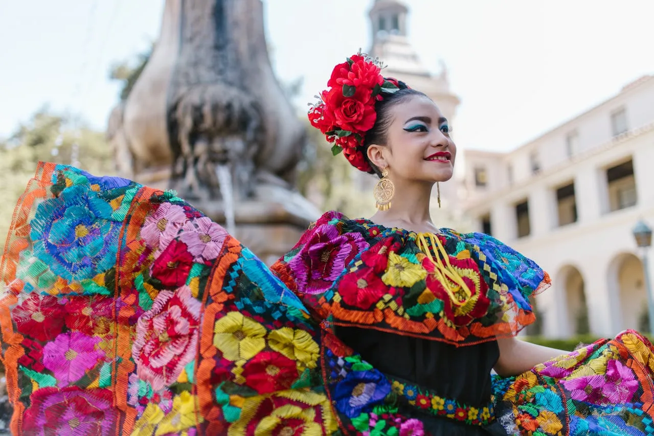 mexican culture represented by young woman in colorful dress