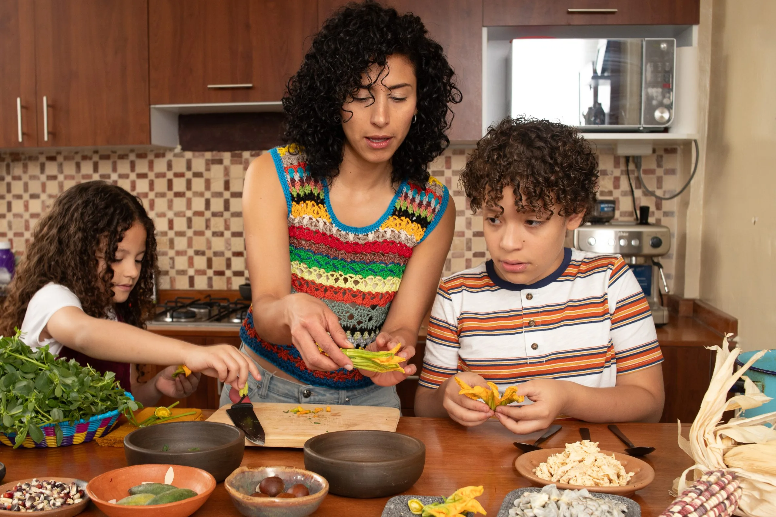 Colombian Au Pair teaching children how to cook