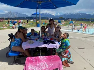 Noelia and her host family at the lake