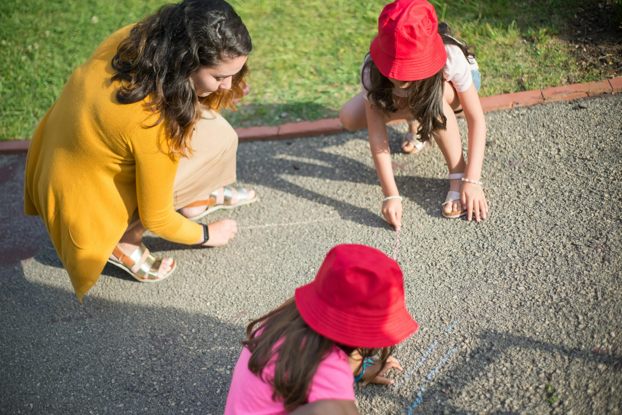 Polish Au Pair playing outside with children