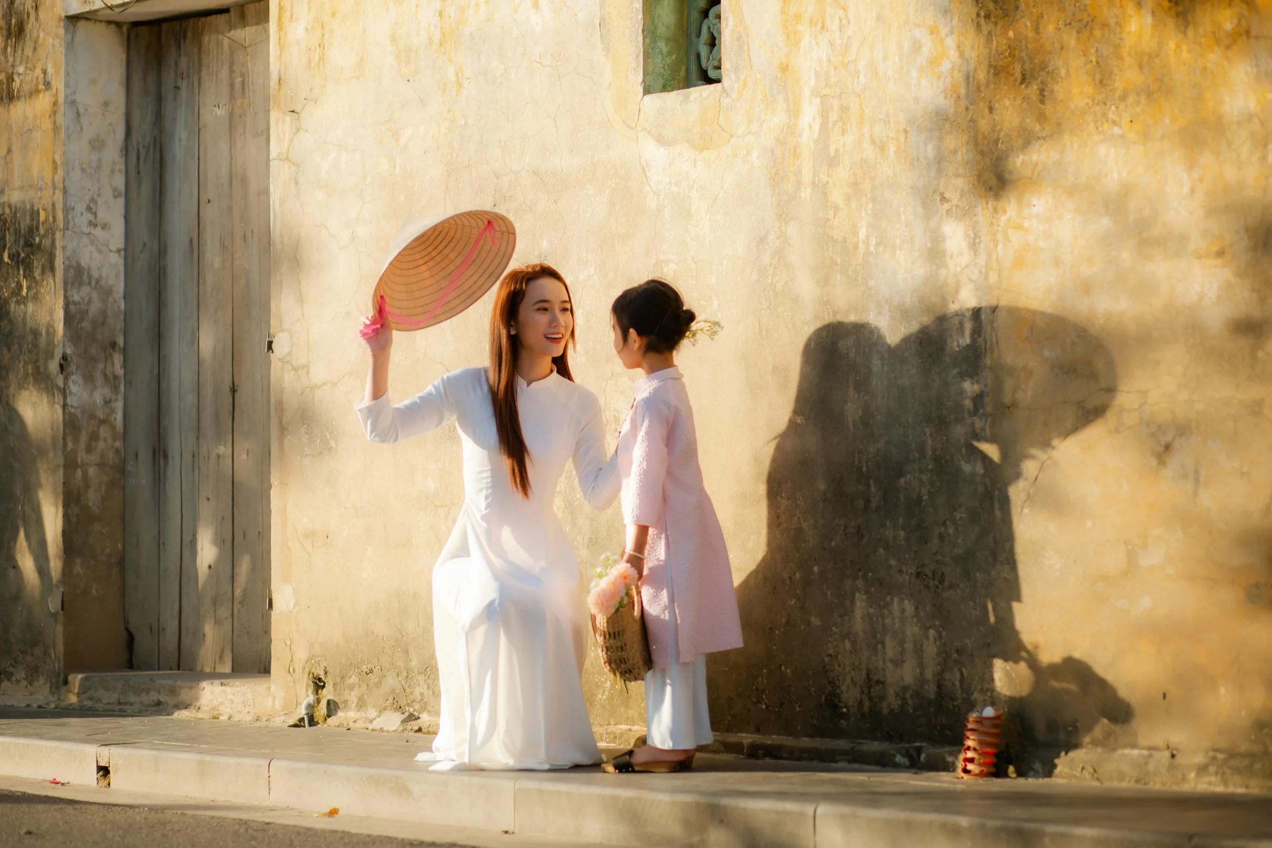 Vietnamese Au Pair sharing culture with child